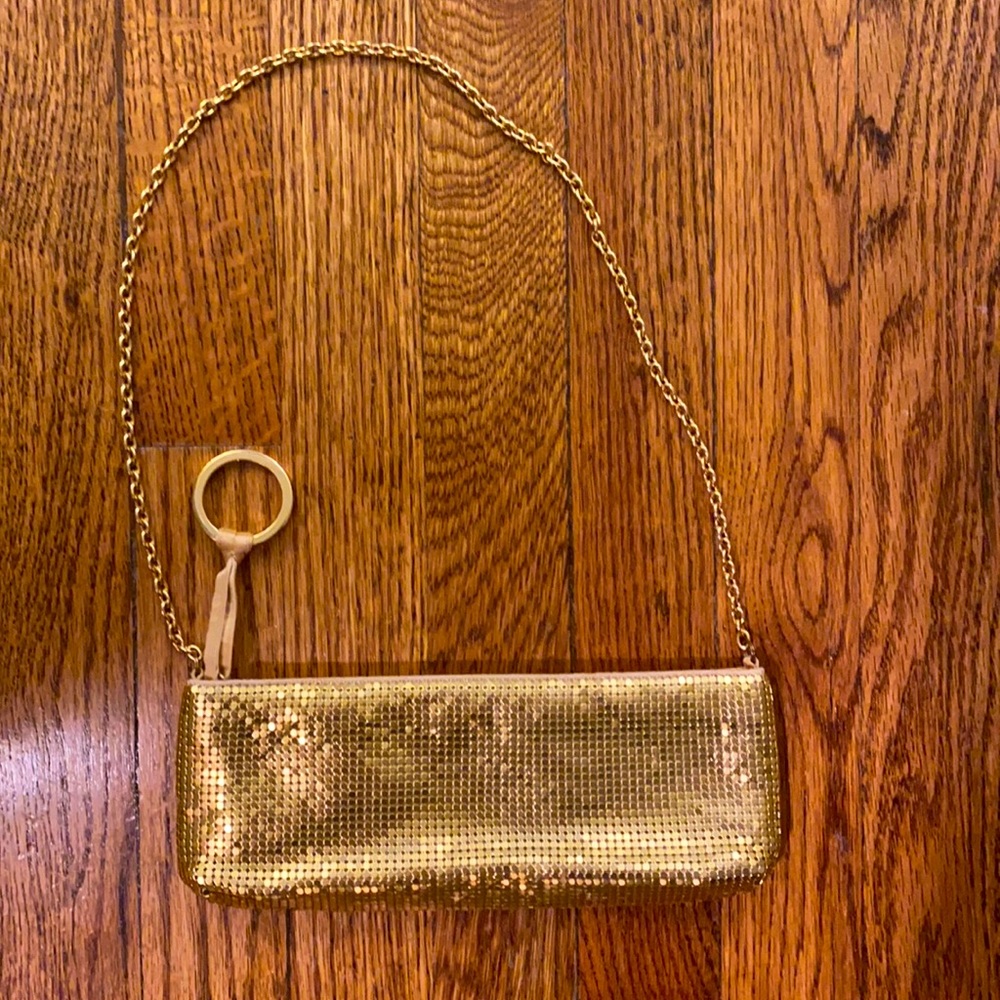BCBG Max Azria gold zipper clutch with chain